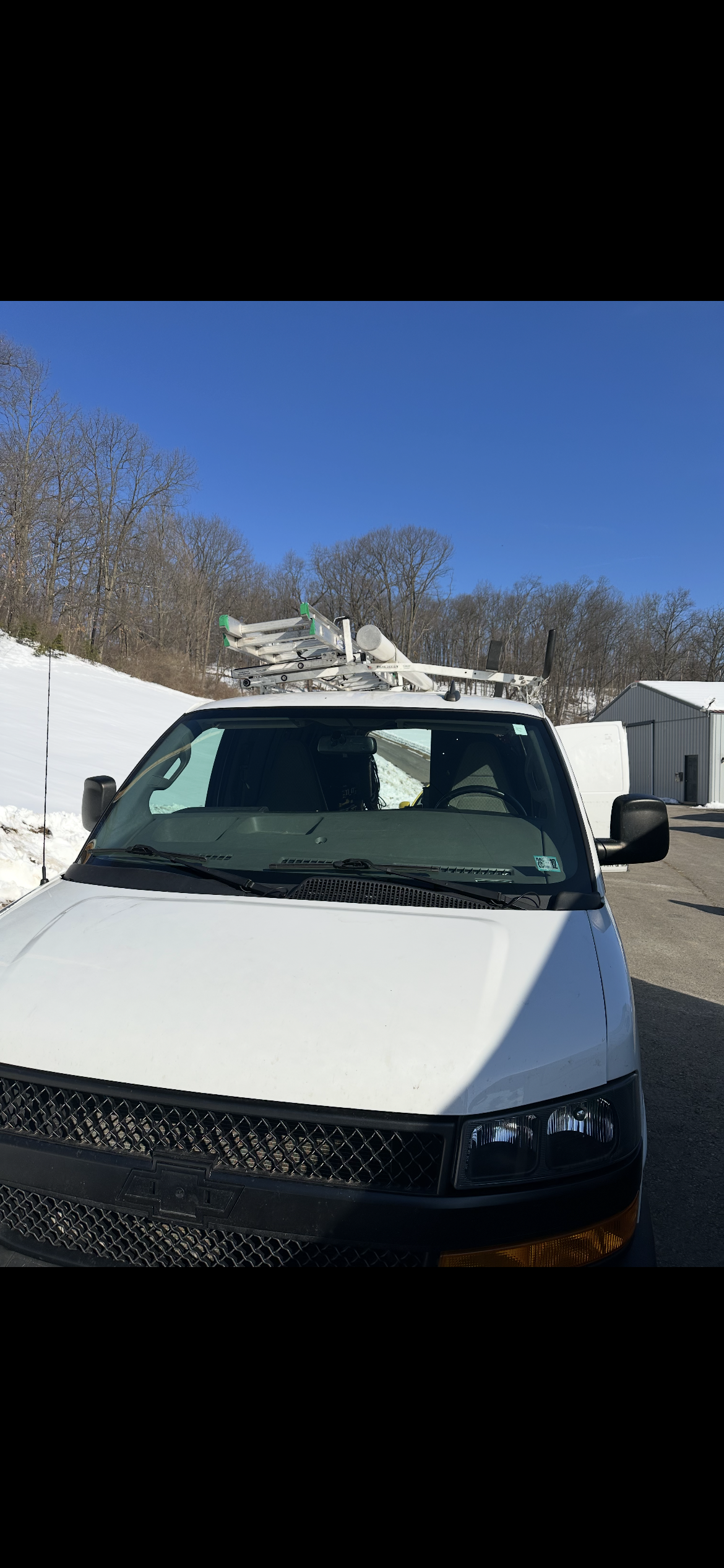 New windshield installed — white work van